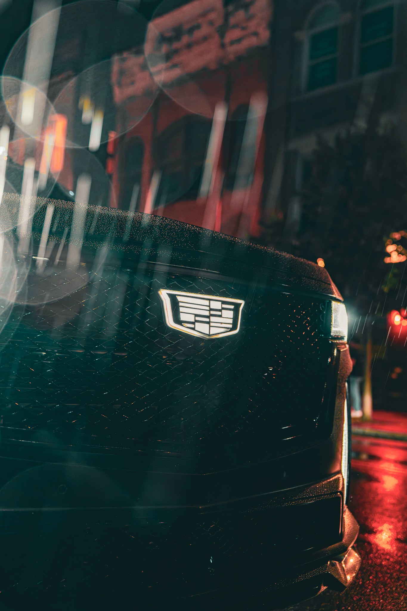Cadillac photographed at night in the rain by La Camera